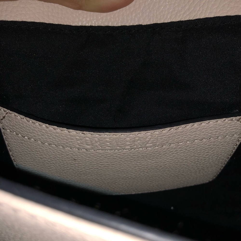 A cute light pink purse